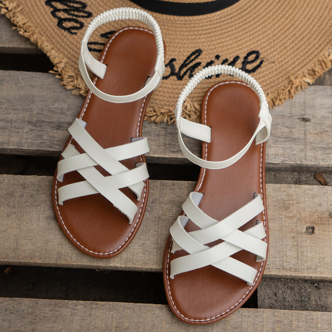 NAIARA - SANDALIAS PLANAS CRUZADAS